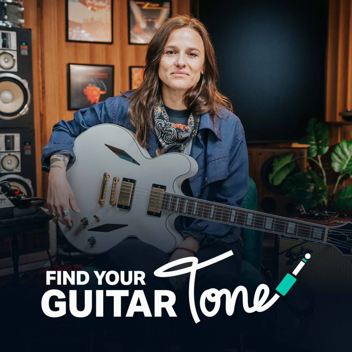 Person holding a white electric guitar in a music studio with 'Find Your Guitar Tone' branding.